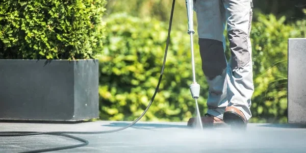 depositphotos_206409996-stock-photo-patio-pressure-cleaning-caucasian-men